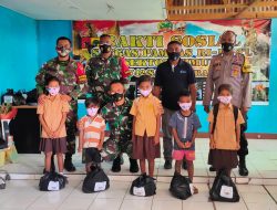 Satgas Pamtas Sektor Timur Gelar Yankes Gratis dan Berbagi Sembako
