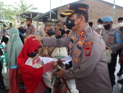 Polres Batubara Bersama Komunitas Sedekah Jum’at Bakti Sosial Di Desa Aras