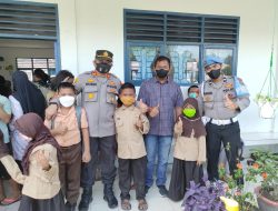 Kapolsek Lima Puluh AKP Rusdi Pantau Pelaksanaan Vaksinasi Anak.