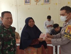 Bhabinkamtibmas dan Babinsa Amankan Pembagian BLT