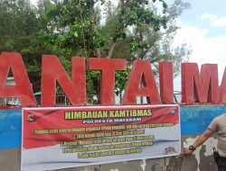 Personil Polsek Ampenan Pasang Spanduk Himbauan