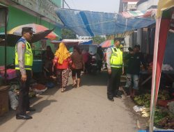 Antisipasi Gangguan Keamanan, Personil Polsek Salapian Melaksanakan Patroli di Pasar Tradisional