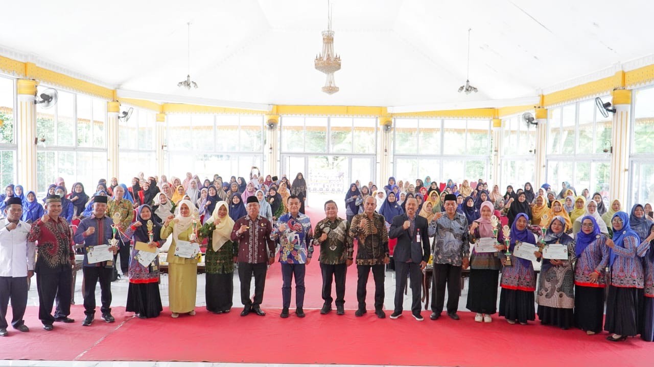 Pj. Bupati Langkat Dorong Guru Jadi Pemimpin Inspiratif di Seminar Hari Guru ke – 79
