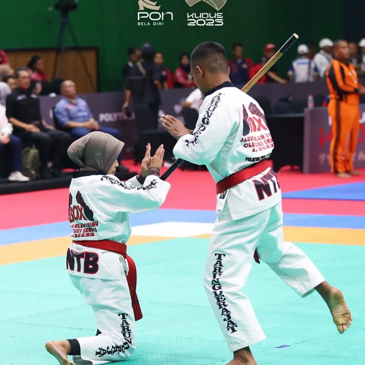 Aura Ratu tien dan Denis Pebrian Atlet PON Binaan Polsek BKU , Polres lombok tengah Seni gerak Berlaga di GOR Kaliputu KUDUS JATENG